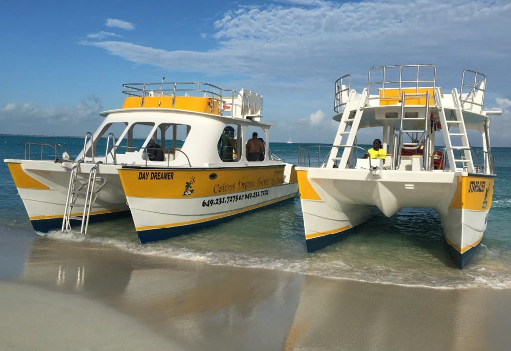 Turks and Caicos double deck boats for tours on beach