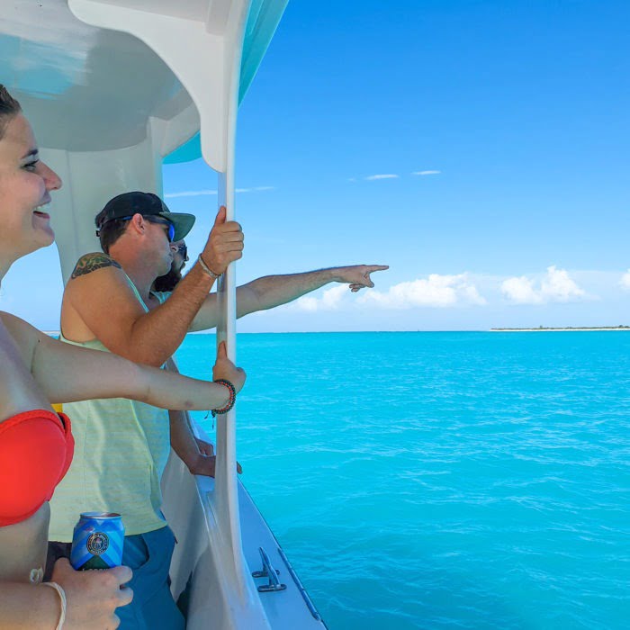 passengers scout the horizon of Turks & Caicos on a cruise excursion