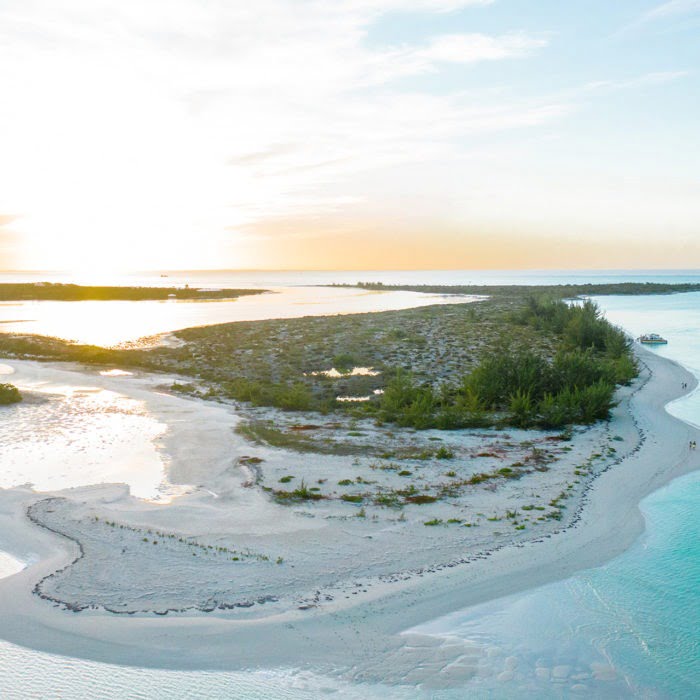 sunset over a remote island in turks & Caicos