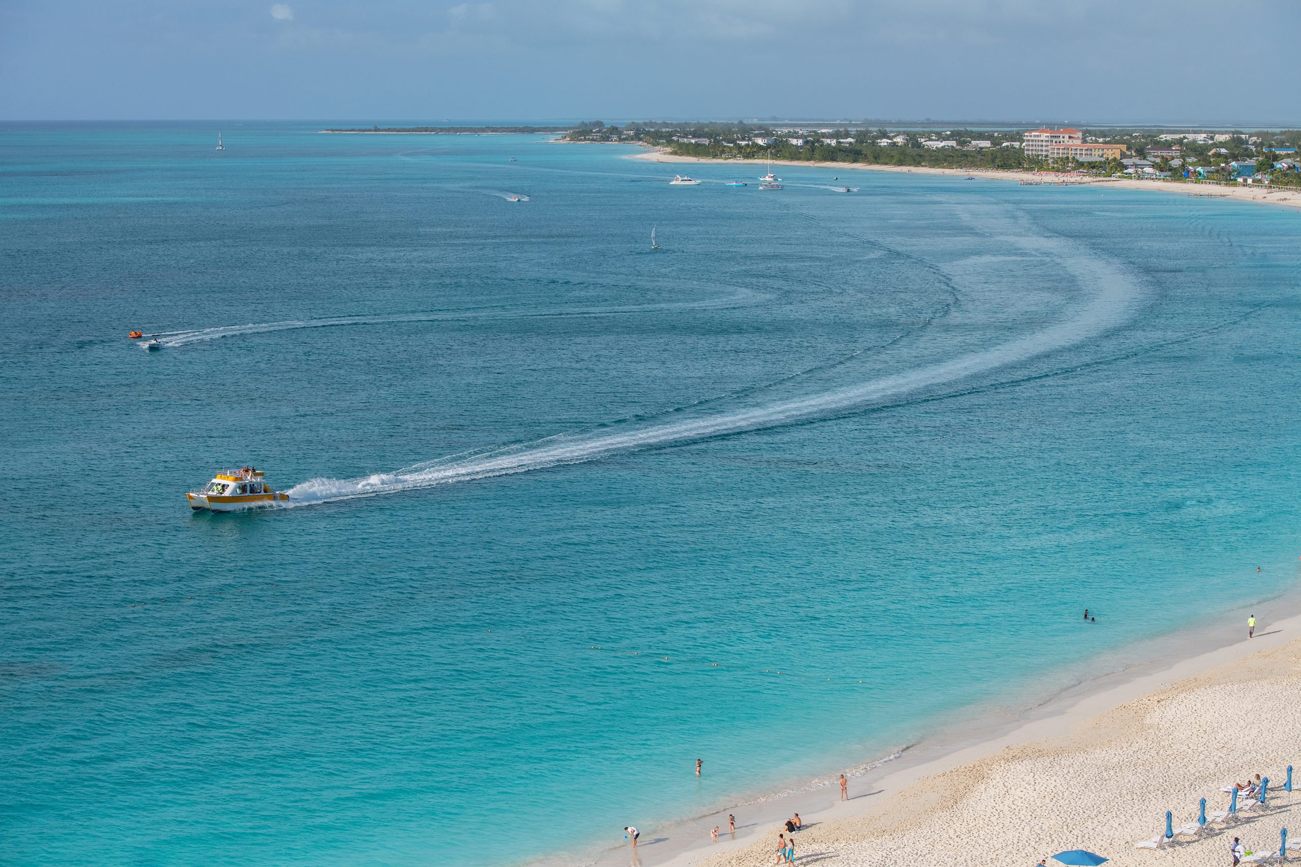 boat off the shore for the best excursions in Turks and Caicos