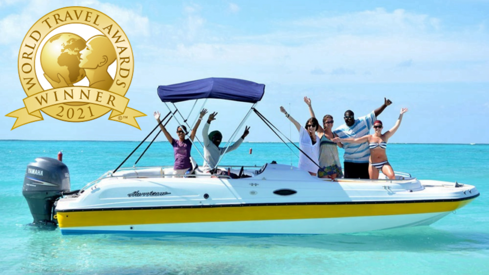a group of people on a boat in the water