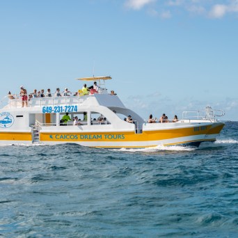 a small boat in a large body of water