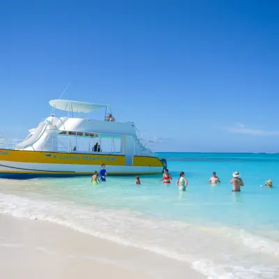 a blue boat sitting on top of a beach