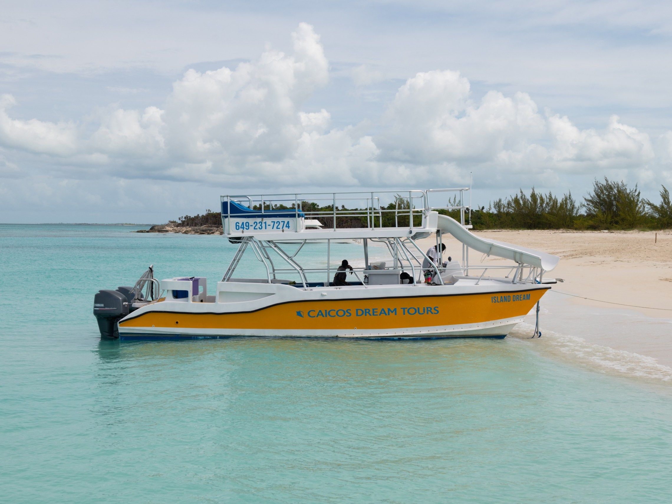a small boat in a large body of water