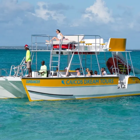 a small boat in a large body of water