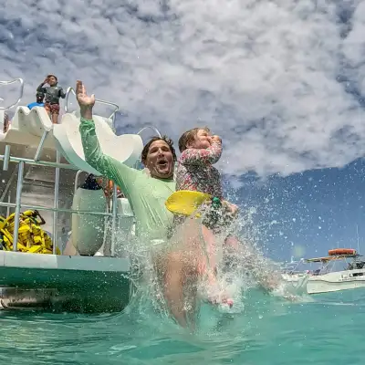 a group of people swimming in the water