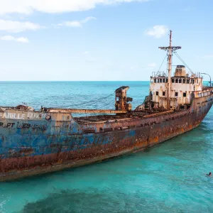 a boat is docked next to a body of water