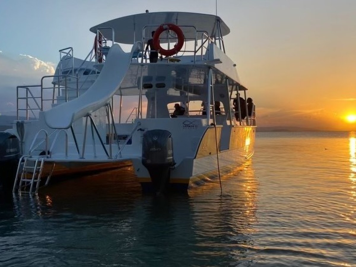 a small boat in a large body of water