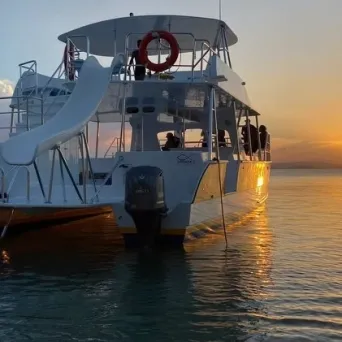 a small boat in a large body of water