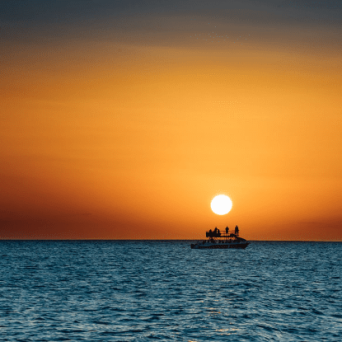 a sunset over a body of water