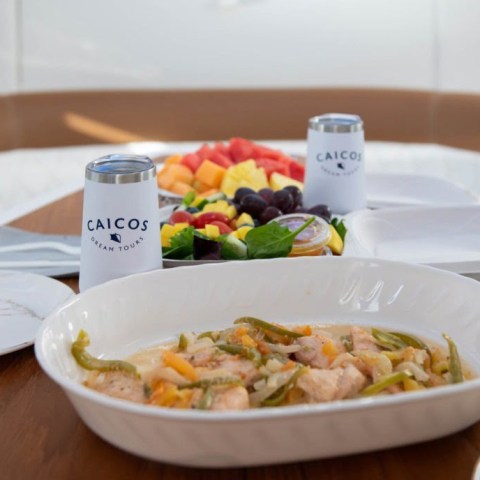 a bowl of food on a plate on a table