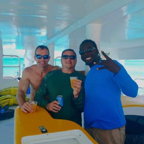 a man standing in front of a boat