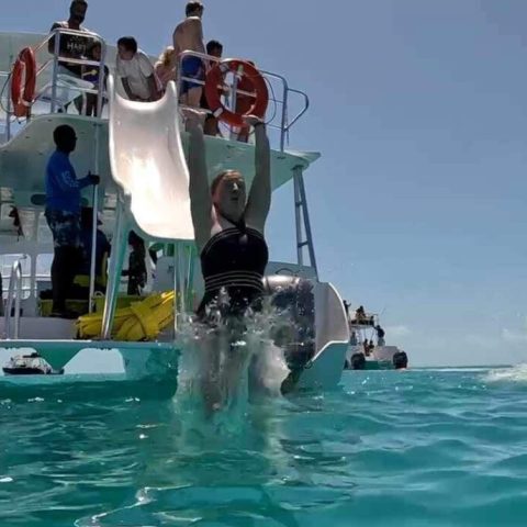 a group of people swimming in the water