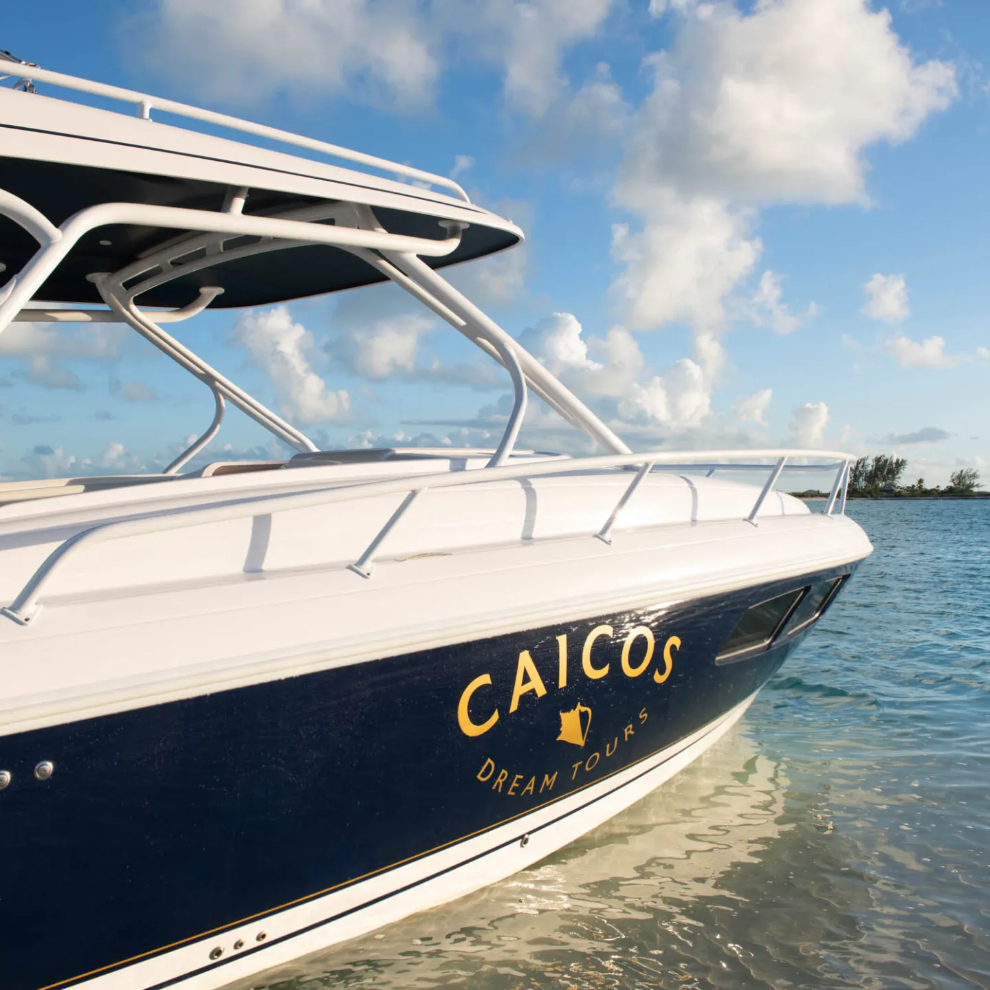 a close up of a boat next to a body of water
