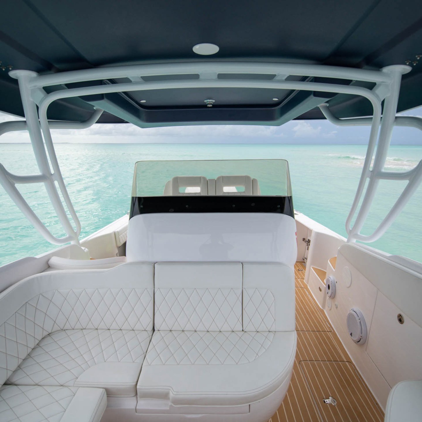 a boat sitting on top of a car