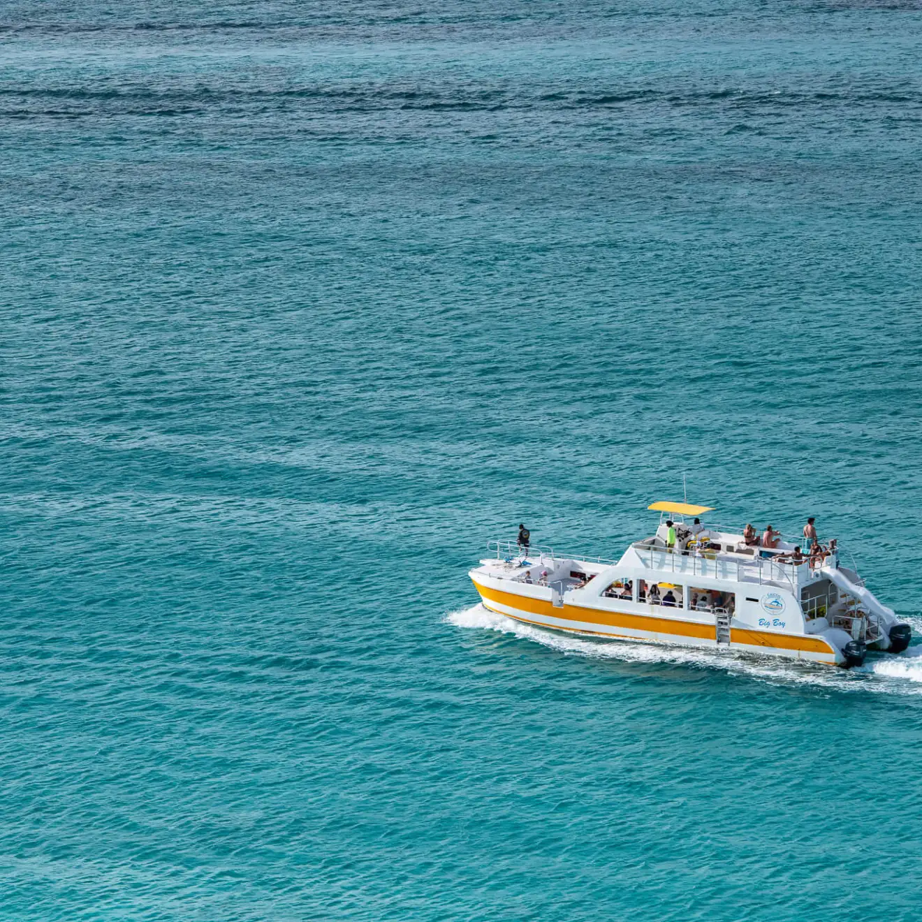 a small boat in a large body of water