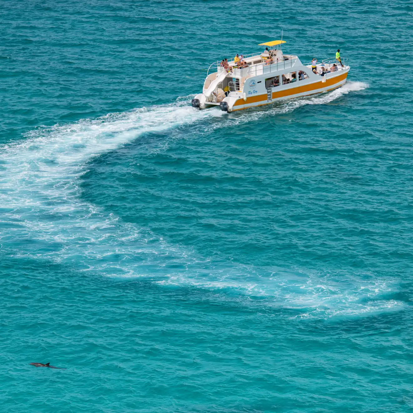 a small boat in a large body of water