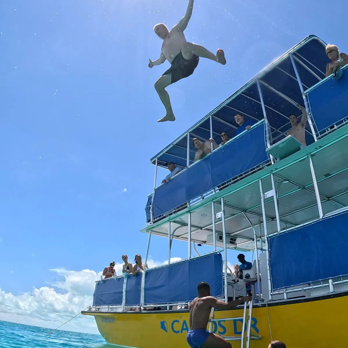 a person riding on the back of a boat