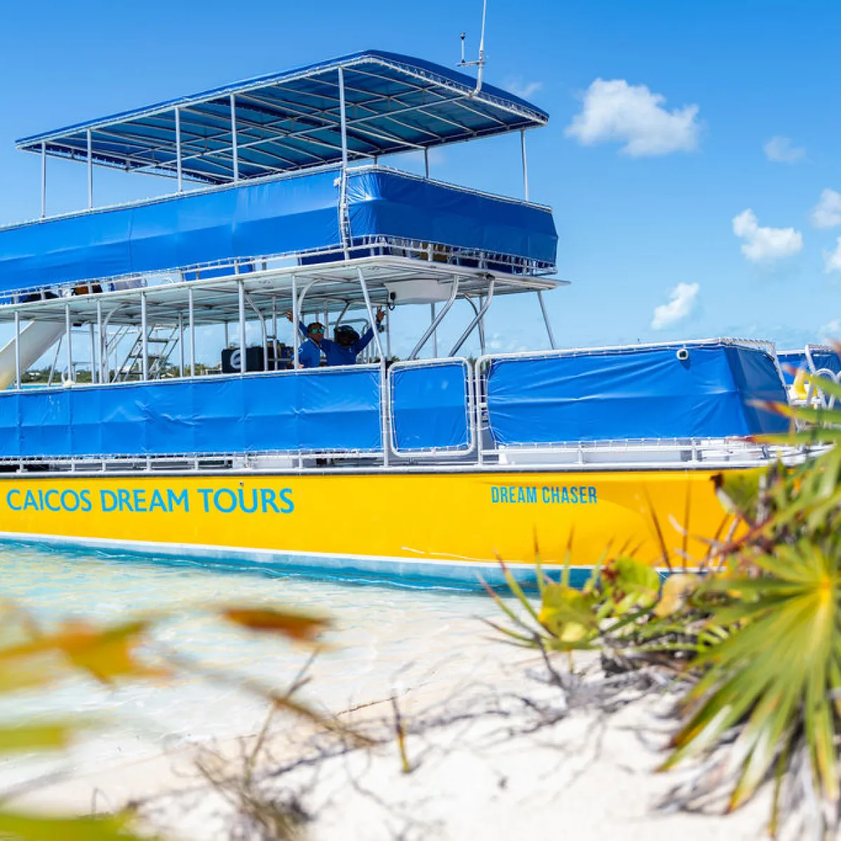 a blue and white boat in the water